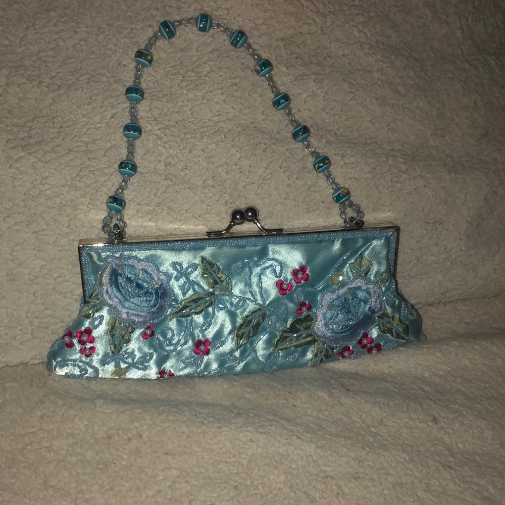 Light blue flower embroidered clutch
